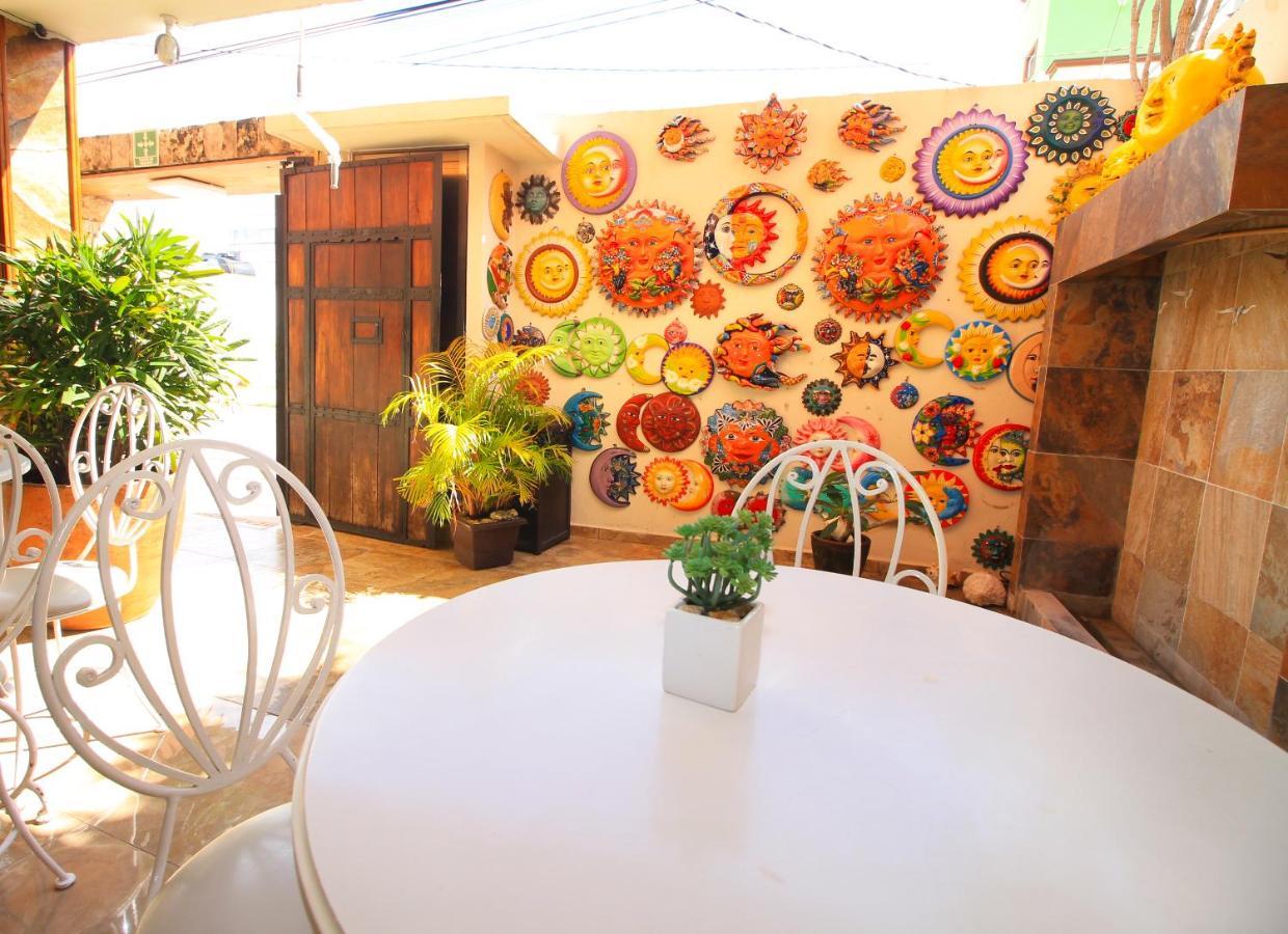 Papagayo Hotel Boutique Playa del Carmen Extérieur photo A patio in the center of the house