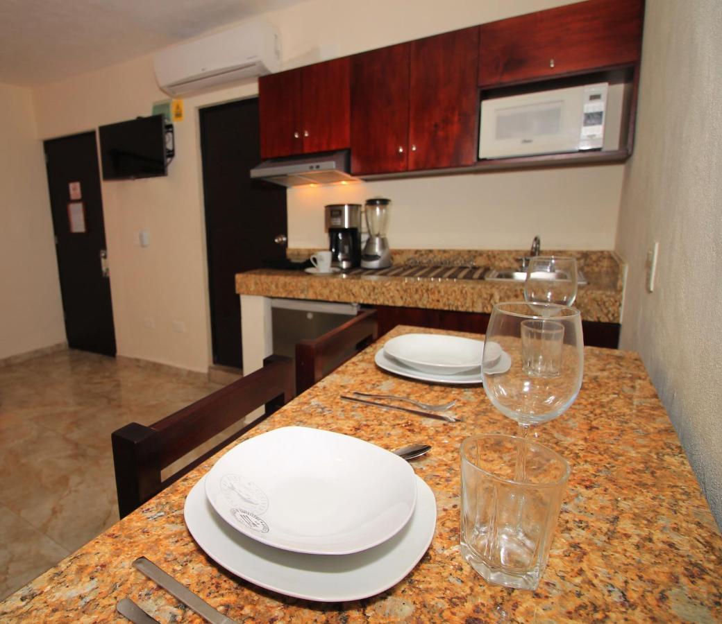 Papagayo Hotel Boutique Playa del Carmen Extérieur photo Kitchenette