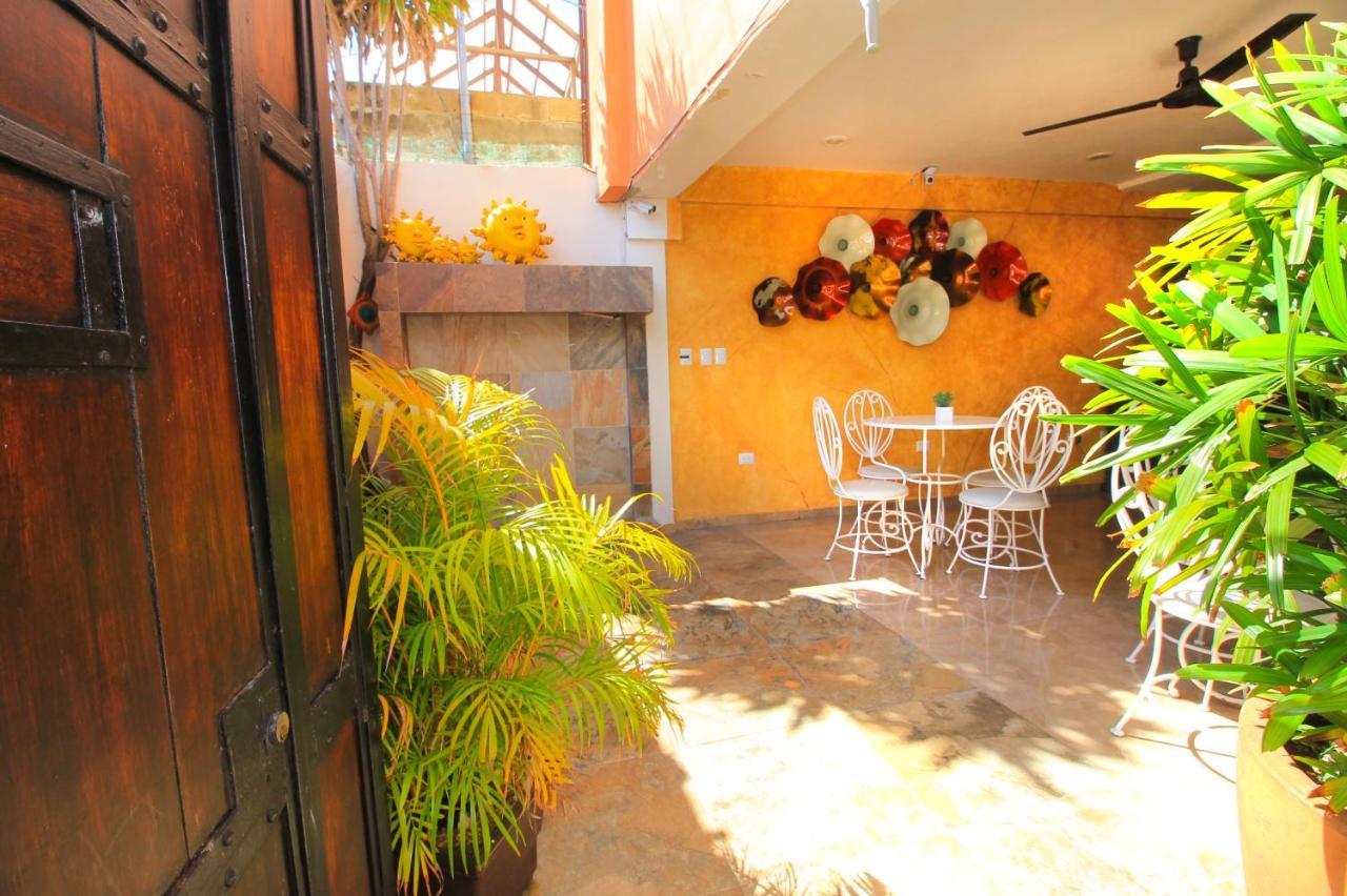 Papagayo Hotel Boutique Playa del Carmen Extérieur photo The courtyard at the San Diego Museum of Contemporary Art