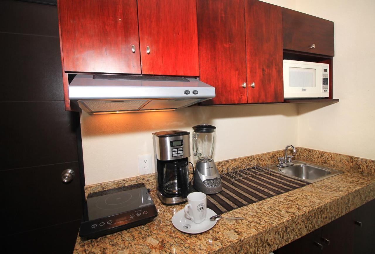 Papagayo Hotel Boutique Playa del Carmen Extérieur photo A coffeemaker in a kitchen