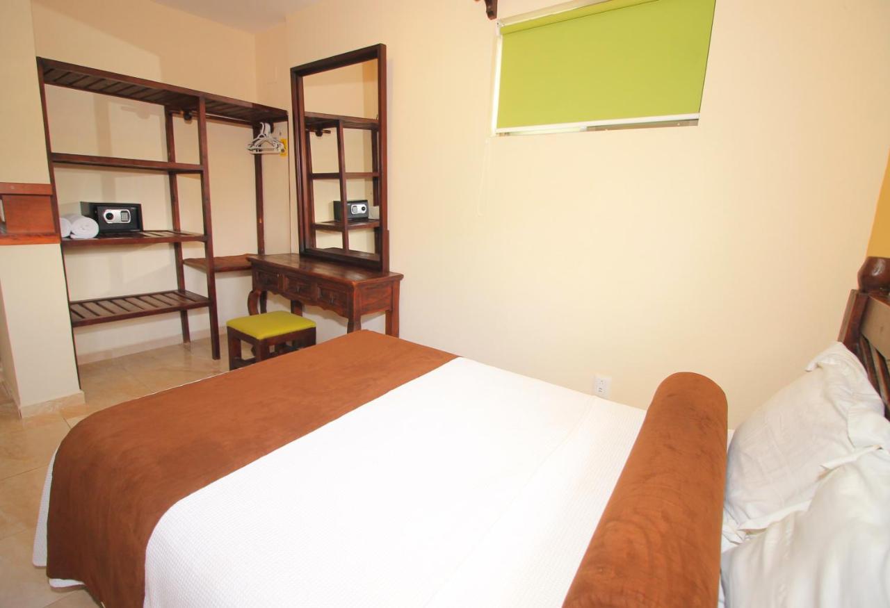 Papagayo Hotel Boutique Playa del Carmen Extérieur photo A bedroom at the hotel