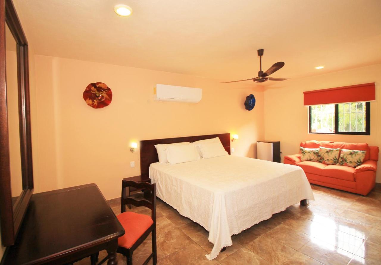 Papagayo Hotel Boutique Playa del Carmen Extérieur photo A bedroom at the hotel