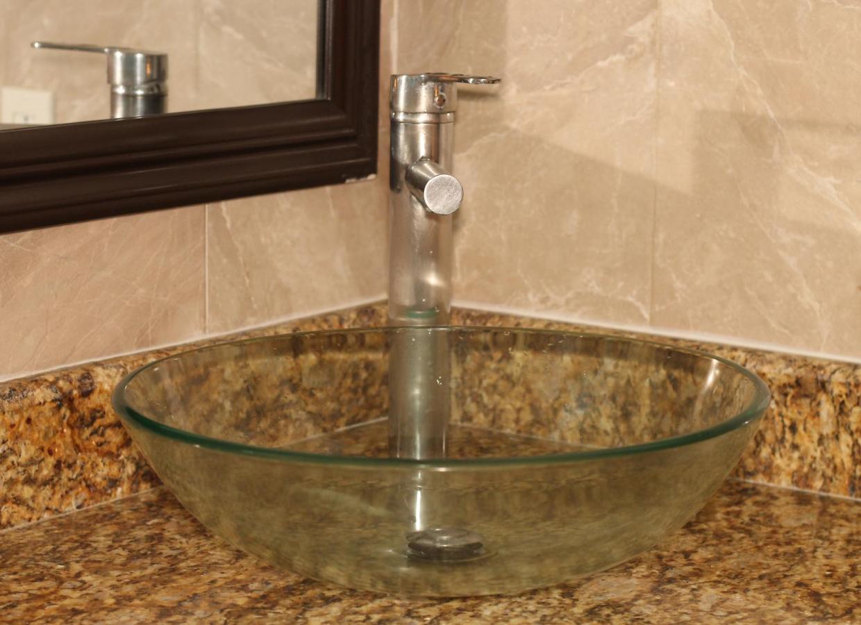 Papagayo Hotel Boutique Playa del Carmen Extérieur photo A vessel sink
