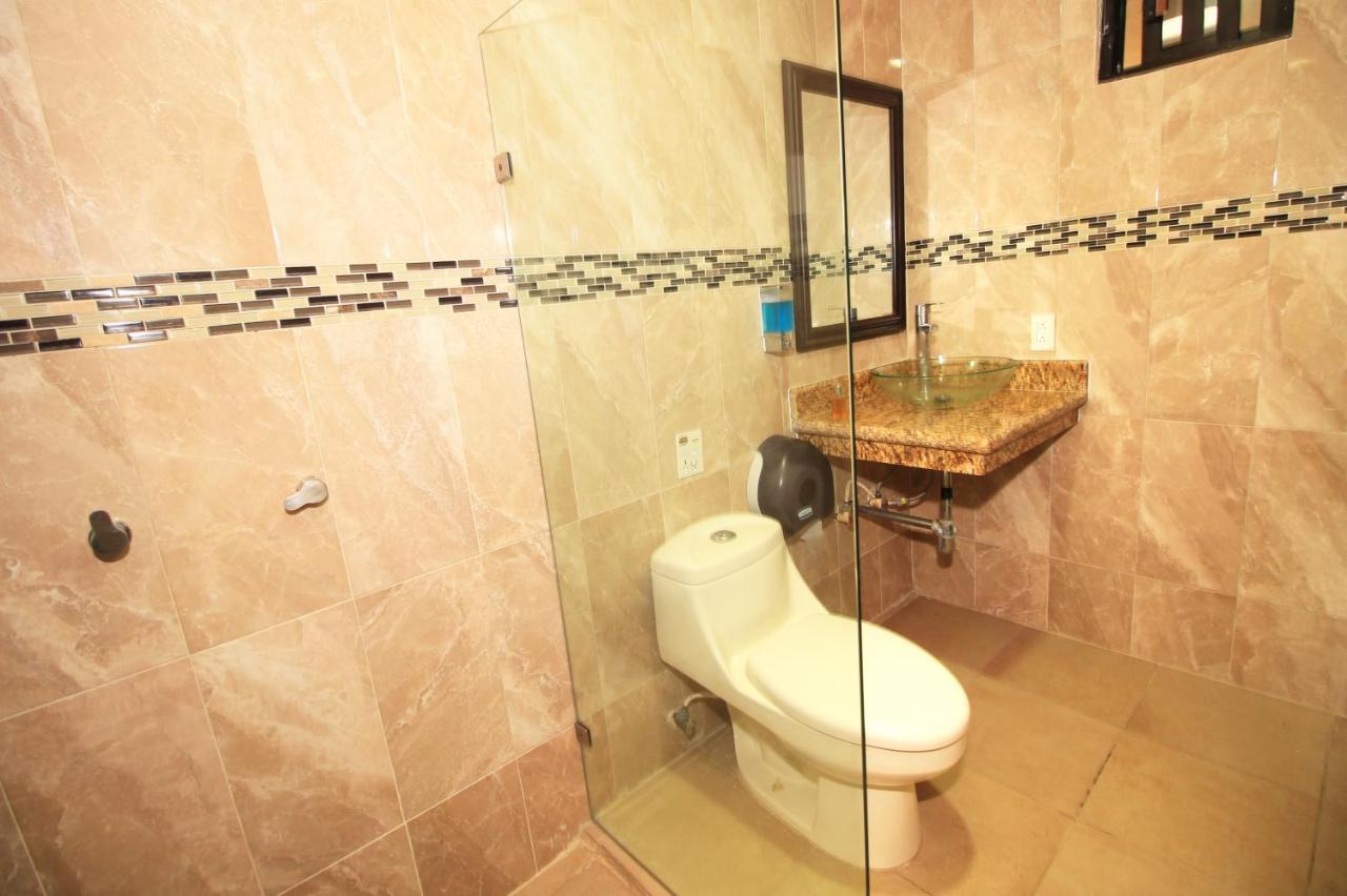 Papagayo Hotel Boutique Playa del Carmen Extérieur photo Bathroom
